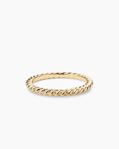 a yellow gold ring with twisted rope detailing on the outside, and a thin band