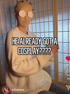 a man in a white sweater is holding his hands up to his chest and the caption reads, he already got a cosplay?????????