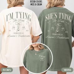 two women wearing matching tshirts with the words i'm tying on them