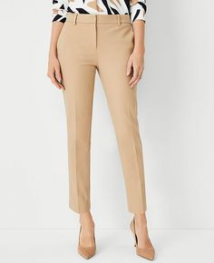 Elevate your wardrobe with the Ann Taylor Eva Ankle Pant in a sophisticated Cappuccino Tan. Designed specifically for a curvy fit, these pants offer a flattering silhouette with a fuller hip and thigh area, ensuring comfort without sacrificing style. 

- Size: 0
- Fit: Curvy
- Length: Ankle-length with a 27" inseam and 14 1/2" leg opening
- Rise: Mid-rise, sits 2 1/4" below the natural waist
- Material: 92% Cotton, 8% Spandex
- Color: Cappuccino Tan
- Gender: Female
- Garment Care: Machine washa Slacks Women, Lean Legs, Chic Pants, Knitted Suit, Tan Woman, Tall Pants, Petite Outfits, Slim Leg, Ankle Pants