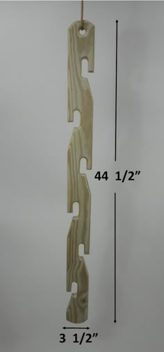 the measurements for an unfinished wooden door hanger