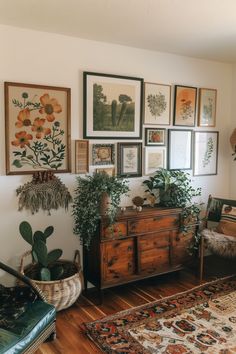 a living room filled with lots of pictures and plants