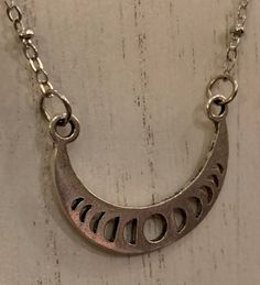 Crescent Moon Phase Necklace - Etsy Adjustable Moon Phase Necklace, Adjustable Metal Necklace With Sun And Moon Design, Moon Phase Metal Jewelry, Metal Moon Phase Jewelry In Moon Shape, Metal Moon Phase Jewelry, Adjustable Sun And Moon Metal Necklace, Adjustable Sun And Moon Design Metal Necklace, Adjustable Sun And Moon Necklace, Nickel Free Half Moon Silver Necklace