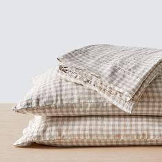 three pillows stacked on top of each other