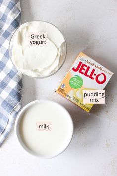 yogurt and pudding mix in bowls next to a blue gingham towel