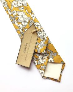 Men’s mustard yellow floral tie #mustardyellow #floraltie #yellowtie #mensfloraltie #mensyellowtie #mensmustardtie #mustardyellowwedding #groomstie #groomswear #floralweddingties Floral Tie Wedding, Mustard And Grey, Rich Wedding