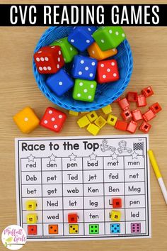 a basket full of dices next to a printable race to the top game