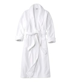 Perfect right out of the shower or any time, this spa-quality robe is incredibly plush on the outside with soft, absorbent terry texture on the inside. Relaxed Fit: Our most generous fit sits farthest from the body. Falls below calf - 48¾" from high point shoulder. In the most comfortable blend of 90% cotton and 10% polyester. Machine wash and dry. Locker loop for easy hanging. Shawl collar. Front patch pockets. Removable tie belt at waist. Imported. | Women's Soft Plush Terry Robe, Cotton Blend Terry Cloth Robe, Terry Robe, Women's Robe, Womens Robes, Christmas 2020, Sleepwear Robe, High Point, Terry Cloth, Sleepwear Women