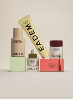 an assortment of beauty products displayed on top of each other