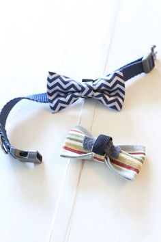 two bow ties are laying on top of each other