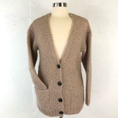 Beautiful Chunky Knit Cardigan Sweater From Maison Scotch (Scotch And Soda Women's Department) In Mixed Beige And Pink Thread. Tagged Size 1. Condition Is New Without Tags (Extra Button Bag Still Attached). I'm Open To Reasonable Offers. Measures 20" Pit To Pit, 21" Shoulder To Shoulder, And 27" Down The Middle Of The Back. Let Me Know If You Have Questions. Casual Wool Knitted Cardigan, Cozy Brown Sweater Coat For Everyday, Fitted Cozy Knitted Cardigan, Cozy Brown Cardigan For Everyday Wear, Vintage Open Knit Cardigan For Fall, Casual Brown Knitted Cardigan, Brown Knitted Casual Cardigan, Brown Knit Casual Cardigan, Brown Knitted One Size Cardigan