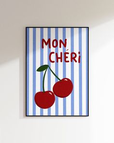 a blue and white striped wall with two cherries on it