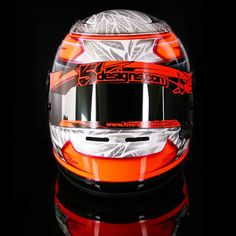 a helmet is shown on a reflective surface