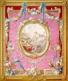 an ornately decorated wall hanging with a painting on it's side and gold frame