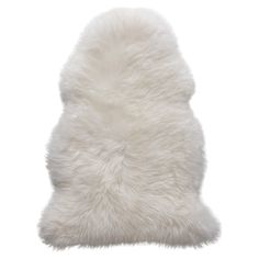 a white sheepskin pillow on a white background