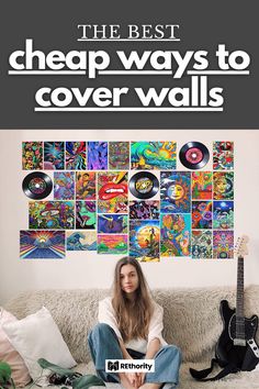 a woman sitting on top of a couch in front of a wall covered with records