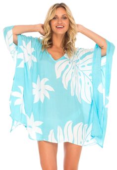 Having a stylish beach cover up is a must! The beautifully printed tunic beach cover up creates a vibrant look. Easy to pull on and easy to pack. Making clothes for the traveling woman. Boho design Lightweight beach dress Semi-Sheer Hand wash in cold water, hang to dry Casual V-neck Beach Poncho, Beach V-neck Printed Kaftan, Floral Print V-neck Cover-up For Vacation, Printed Beach Cover-up With Kimono Sleeves, Lightweight V-neck Cover-up For Beachwear, Summer V-neck Tunic For Vacation, Tropical V-neck Kaftan For Beach Cover-up, Multicolor Poncho For Beach Cover-up In Summer, Oversized Poncho For Spring Vacation