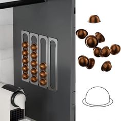 a machine that has some balls on the side of it and an image of another machine behind it