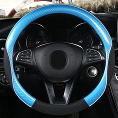 the steering wheel cover is blue and black