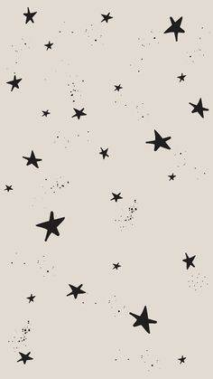 black and white stars are flying in the sky