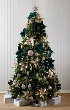 a decorated christmas tree with ornaments and lights