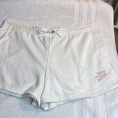 Nike Shorts. Nwot, Brand New, Never Worn. So Practical And Comfortable, You’ll Wear Them All Summer, Perfect For Your Next Vacation! Elastic Drawstring Waistband With Two Side Pockets And Nike Swoosh Logo On Left Side. 80% Cotton/20% Polyester. Machine Washable. Smoke Free Home. White Leisure Shorts, Casual White Shorts For Leisure, Comfortable White Shorts For Spring, Comfortable White Spring Shorts, Casual White Drawstring Bottoms, Casual White Bottoms With Drawstring, Nike Casual White Bottoms, Comfortable Nike Cotton Shorts, White Summer Leisure Bottoms