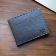 PERSONALISED WALLET WITH MESSAGE Introducing the Personalized Black Leather Men's Wallet - a stylish and durable accessory made from high-quality leather. It features multiple card slots, a spacious bill compartment, and a convenient ID window, making it perfect for any occasion. You have the option to add your initials or a special message to make it a unique and personalized accessory. Add it to your collection today and elevate your everyday style! HOW TO PERSONALISE:- 🔸Select A design from Father's Day Bifold Wallet With Card Slots, Personalized Bifold Wallet For Everyday, Personalized Bifold Wallet, Father's Day Black Wallets With Card Slots, Personalized Black Bifold Wallet, Personalized Bifold Wallet For Daily Use, Father's Day Rectangular Wallets With Card Slots, Black Wallets With Card Slots For Father's Day, Personalized Black Wallet For Personal Use