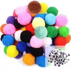 multicolored pom - poms are scattered on top of each other