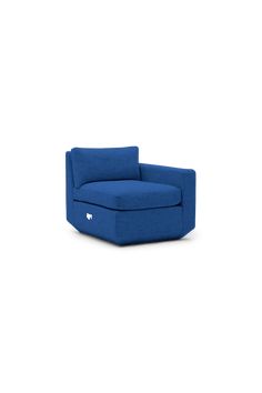 a blue couch sitting on top of a white floor