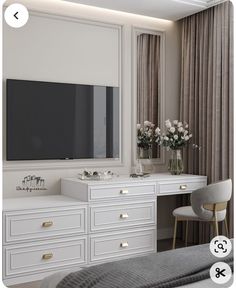 there is a white dresser with drawers and a tv on the wall in this bedroom