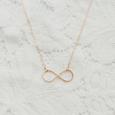 Infinity Cable Chain Jewelry Gift, Everyday Delicate Infinity Chain Necklace, Anniversary Infinity Necklace With Delicate Chain, Dainty Infinity Rose Gold Necklace, Dainty Rose Gold Infinity Necklace, Infinity Necklace With Delicate Chain For Wedding, Minimalist Infinity Necklace For Anniversary Gift, Minimalist Infinity Necklace For Anniversary, Dainty 14k Gold Infinity Necklace