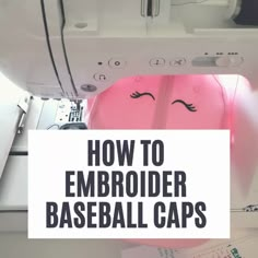 a pink baseball cap with the words how to embroider baseball caps on it