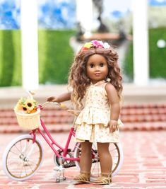 a doll is standing next to a bicycle