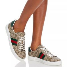 Gucci Ace Monogram Sneakers 100%Authentic New Size Eu 40/Us 9.5 Crafted In Italy, Gucci's Ace Sneakers Feature The Label's Signature Monogram Print And Colorblocked Striping At The Sides. This Lace-Up Style Is Finished With A Platform Sole And Metal Tag At The Vamp. Round Toe Lace-Up Style Canvas Upper Rubber Sole Made In Italy Comes With Original Dust Bag And Box Welcome To Offer Gucci Luxury Lace-up Sneakers, Designer Custom Sneakers With White Sole, Gucci Custom Sneakers With Round Toe And Laces, Designer Gucci Low-top Custom Sneakers, Gucci Casual Slip-on Sneakers, Gucci Tennis Shoes, Gucci Ace Sneakers, Metal Tag, Womens Tennis Shoes