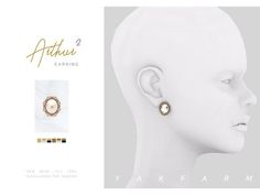 the earring is designed to look like a woman's head