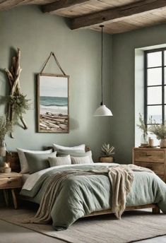 a bed sitting in a bedroom next to a wooden dresser and window with a painting on the wall