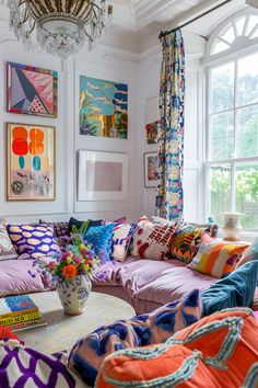 Eclectic Chic: Tour a Stunning Room Where Modern Meets Traditional Decor Colourful Eclectic, Bright Boho Interior Design, Pops Of Color Interior Design, Maximalist Decor Grey Couch, Gray Couch Maximalist, Eccentric Living Room Art, Colorful Transitional Living Room, Bright Rug Living Room Turkish, Eclectic Minimalist Decor