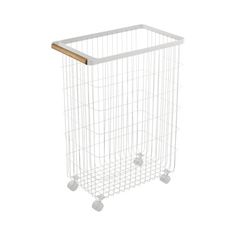 a white wire basket with wooden handle and wheels on the bottom, against a white background