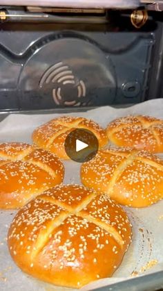 six pretzels are being cooked in an oven