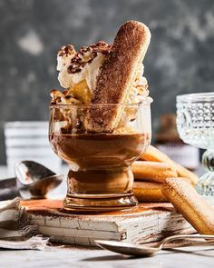 an ice cream sundae in a glass bowl