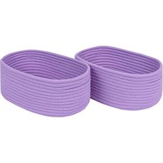 two purple round baskets sitting next to each other