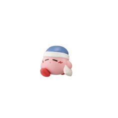 a small pink toy with a blue hat on it's head and one eye closed