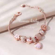 "To available amazing discounts and coupons click on our store! https://www.etsy.com/shop/RococoLadyJewelry?ref=simple-shop-header-name&listing_id=1044529597 Handmade Crystal Heart Charm Bracelet Personalized jewelry rose quartz bracelet, Snake chain rose gold bracelet Valentines day gifts for her ♥ Description ♥ ✨ This stunning Crystal charm bracelet is a complete and wonderful personalized love bracelet, it looks extremely gorgeous specially in the natural light. Use warm tones to warm the hea Bracelet Valentines, Pandora Bracelet Designs, Troll Beads, Custom Charm Bracelet, Rose Quartz Bracelet, Custom Charms, Pandora Charm, Valentines Day Gifts For Her, Rose Gold Bracelet