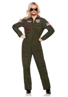 a woman in an air force uniform posing for the camera with her hands on her hips