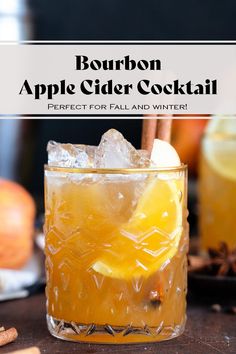 bourbon apple cider cocktail in a glass with ice and cinnamon on the table next to it