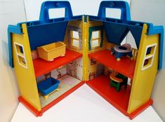 a doll house with furniture and accessories in it