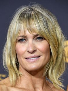 Robin Wright  (Photo by Steve Granitz/WireImage) Celebrity Bangs, Long Natural Curls, Growing Out Bangs, Neutral Blonde, Modern Haircuts, Texturizer On Natural Hair, Short Bob Hairstyles