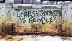 an old metal box with graffiti on it and some words written on the doors that say, core start is people