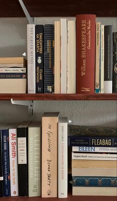 books are lined up on the shelves in this room, and there is no image here to provide a caption for