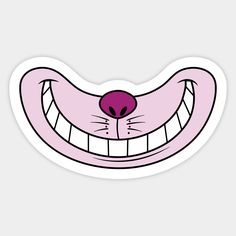 a pink sticker with an evil smile on it's face and big teeth